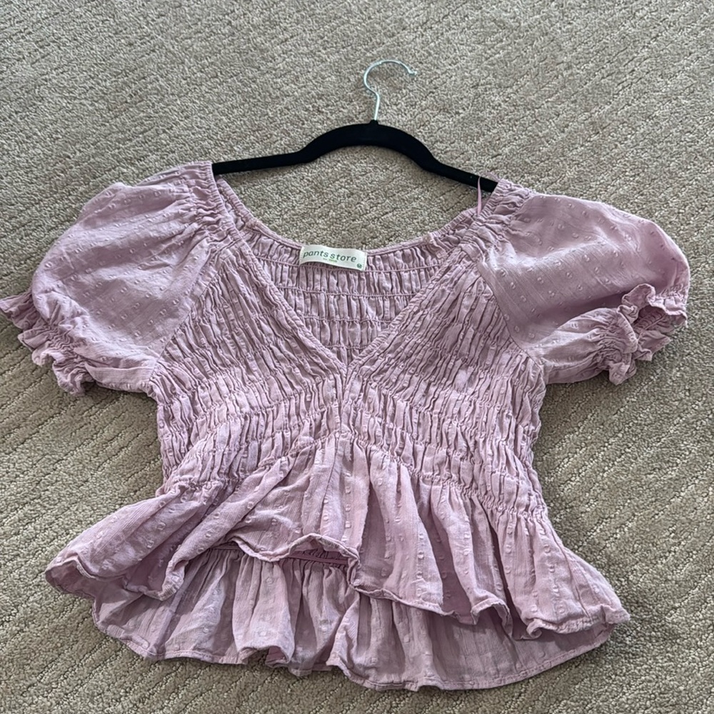 Cute ruffled purple top!